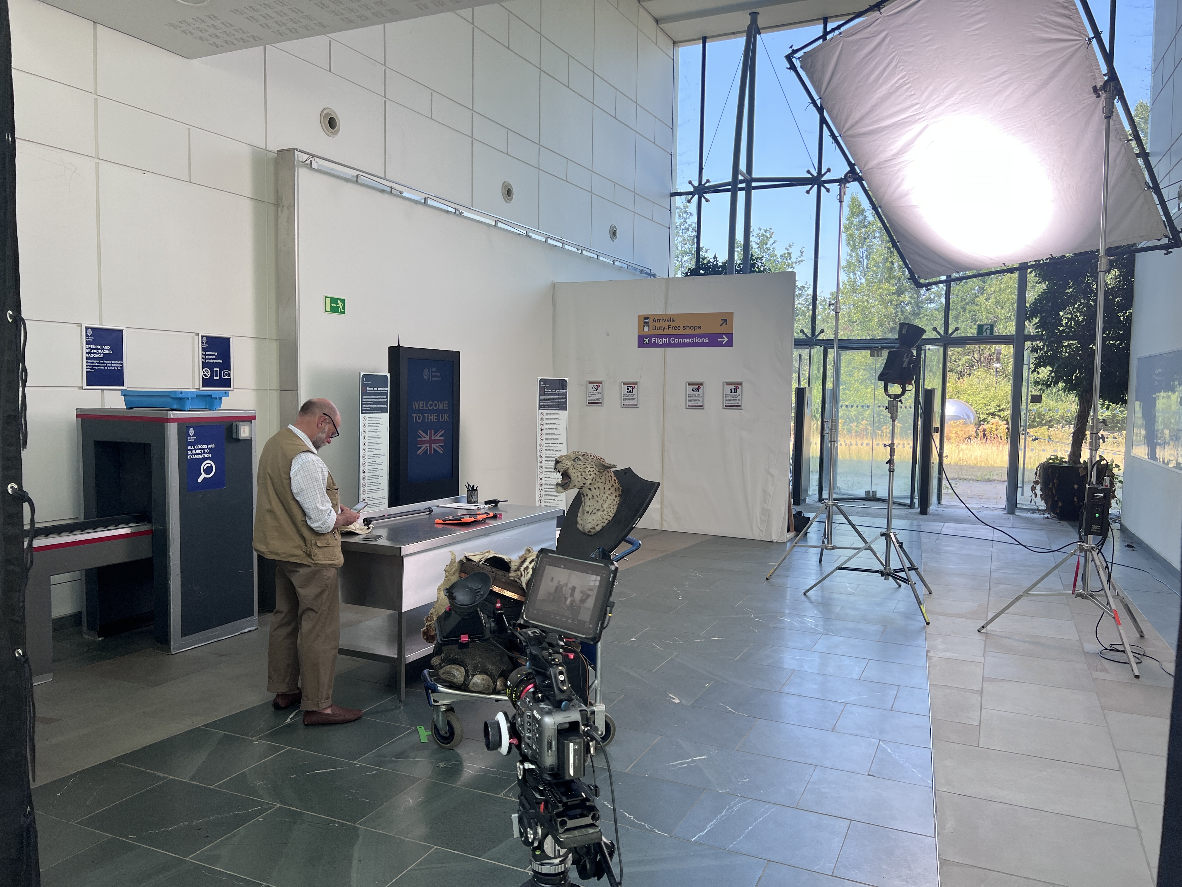 The full customs hall set dressed inside a Brentford office building – Nothing to Declare production design, 2026